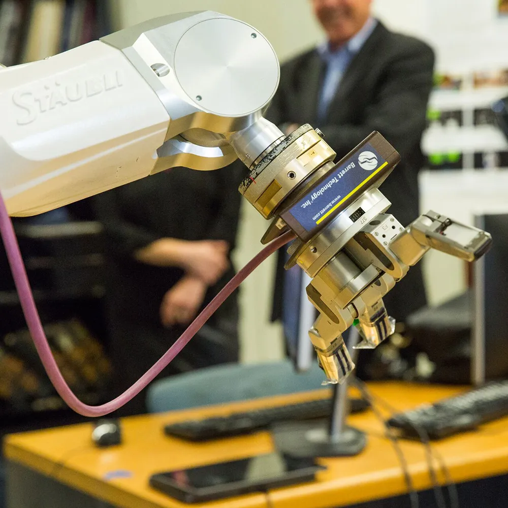 robot gripper with three fingers being actuated open