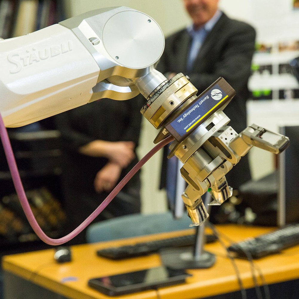 robot gripper with three fingers being actuated open