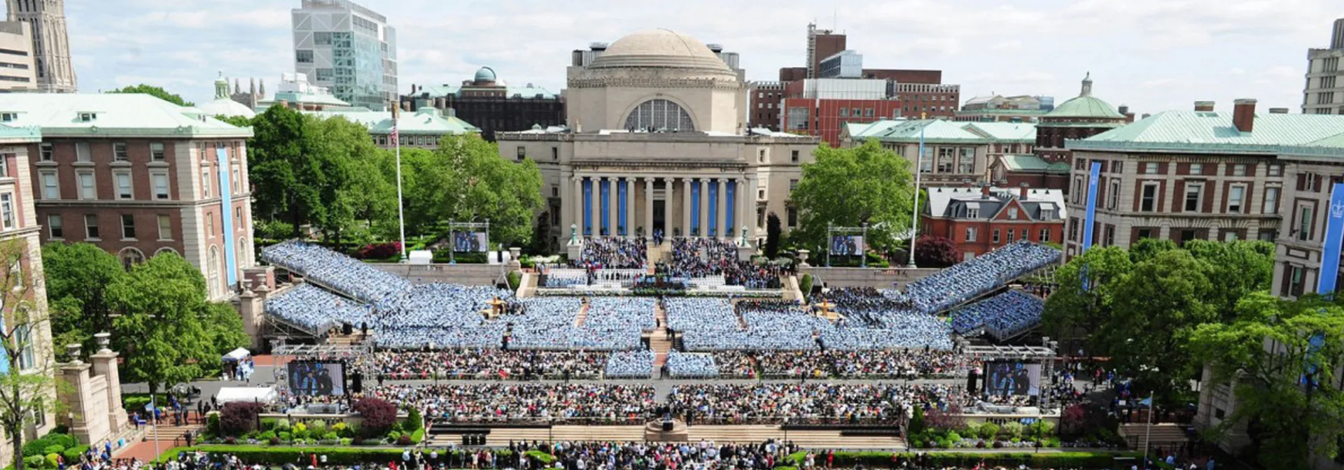 wide angle view of graduation at Columbia facing Low library